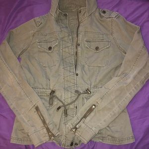 A Olive green sweater/jacket